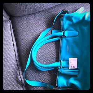 Brand new with tags. Authentic coach.